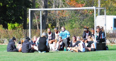 Girls Varsity Field Hockey halftime talk during the St. Ignatius game