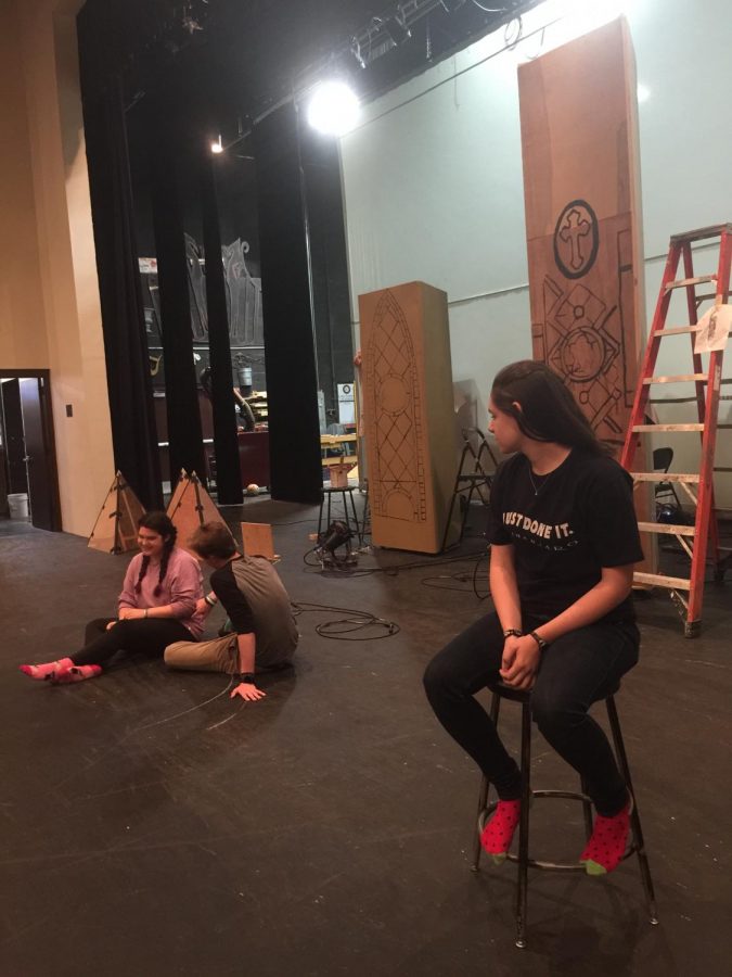 Sophomore, Sophie Waimon, stays in character as Antonio Salierí, listening intently to Mozart, played by senior Dominic Scheerer, and Constanze's, played by Lilah Roth, private conversation in order to sabotage Mozart's career.