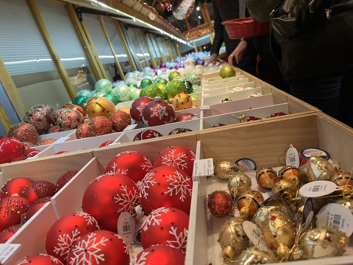 A German vendor sells Christmas ornaments.