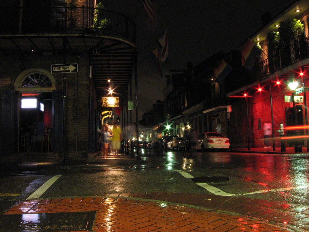 Rain falls on Bourbon Street in the French Quarter.