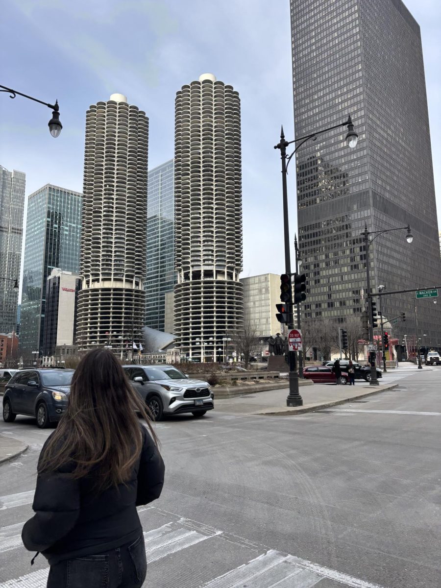 Bella Brecker ‘26 walks along the Chicago River. 