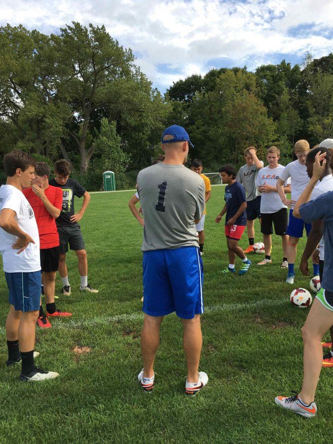 Everyone listens closely to Coach Makovec as he explains the drills of the day. Shifting Gears.