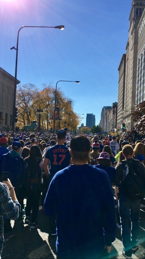 Crowds of people walking through Michigan Avenue to get to Grant park and the Rally