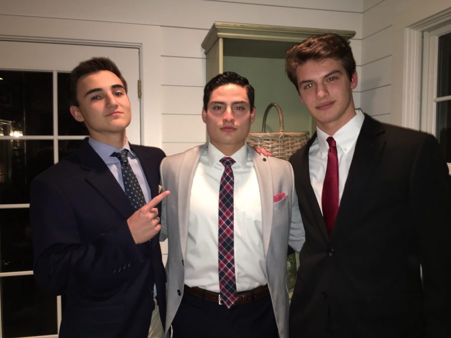 Duncan Ward, Dieter Villegas, and Andrej Hromic posing for photos before last year's Winter Formal.