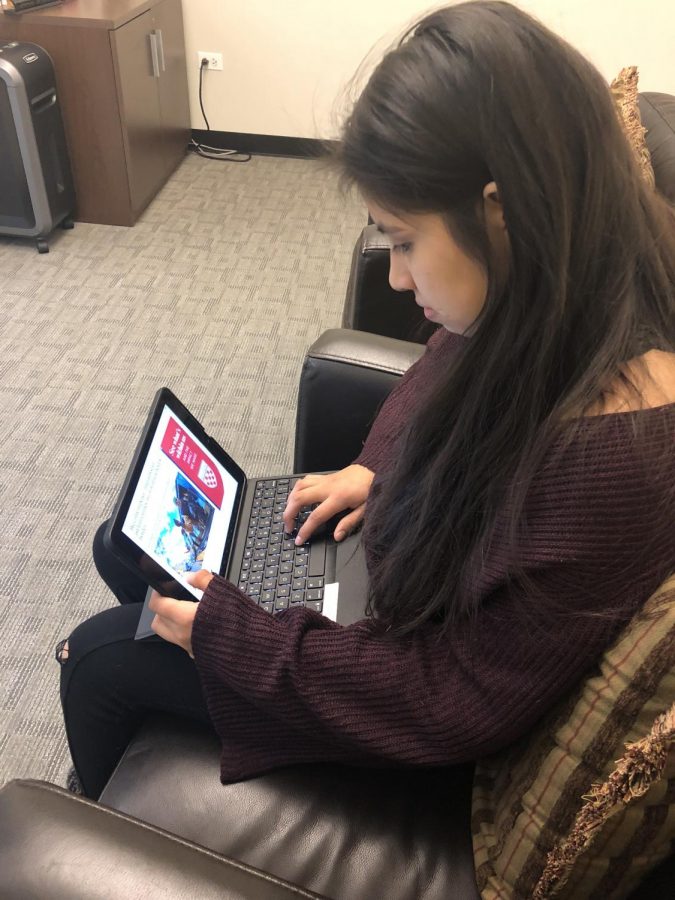 Senior, Diana Tlaseca, reading an article on the migrant caravan.

Photo Courtesy of
Jasmine Filawo