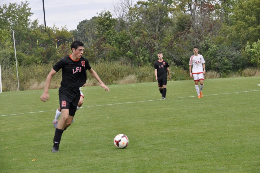 Antonio Ferraiolo '21 plays soccer in a Lake Forest Academy match.