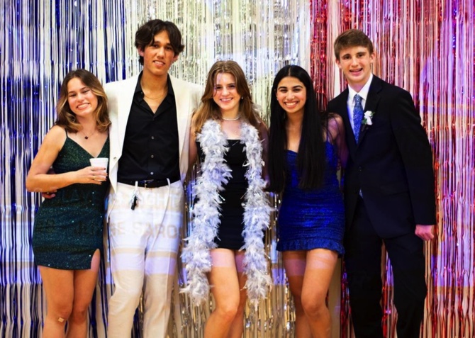 Students pose at Homecoming dance. 