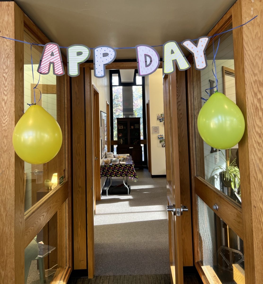 The College Counseling office celebrates as students turn in their applications.