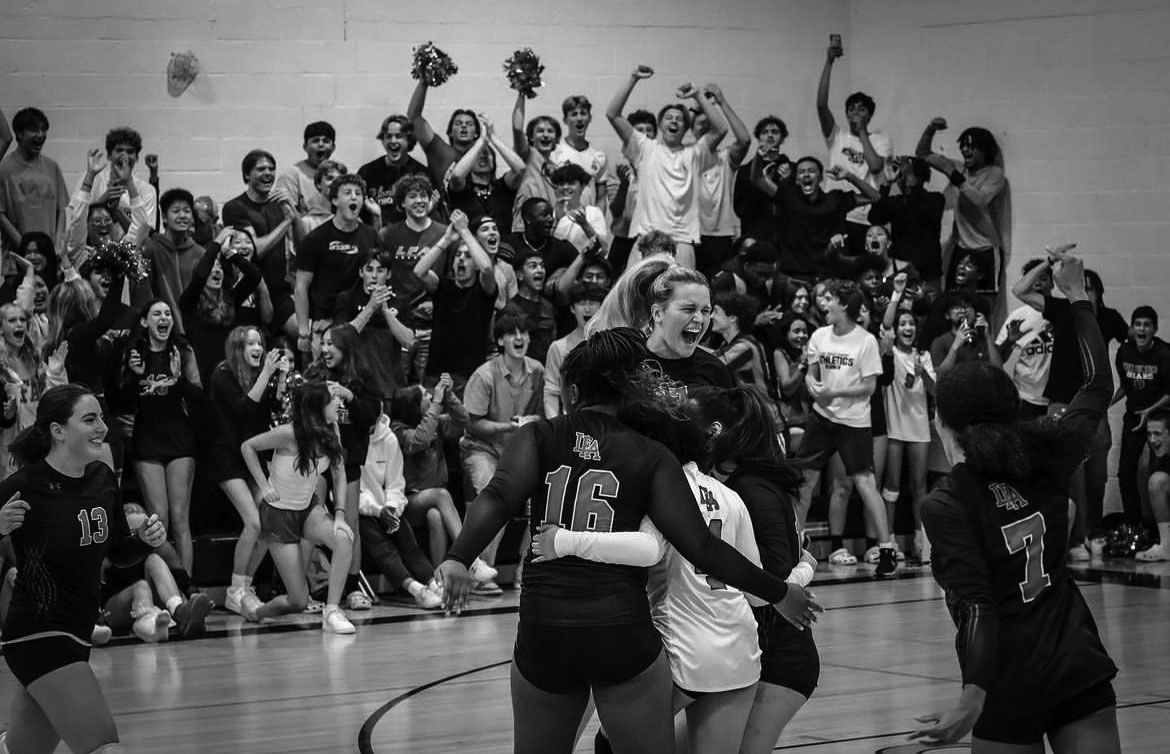 Excitement at Girls Volleyball game. 