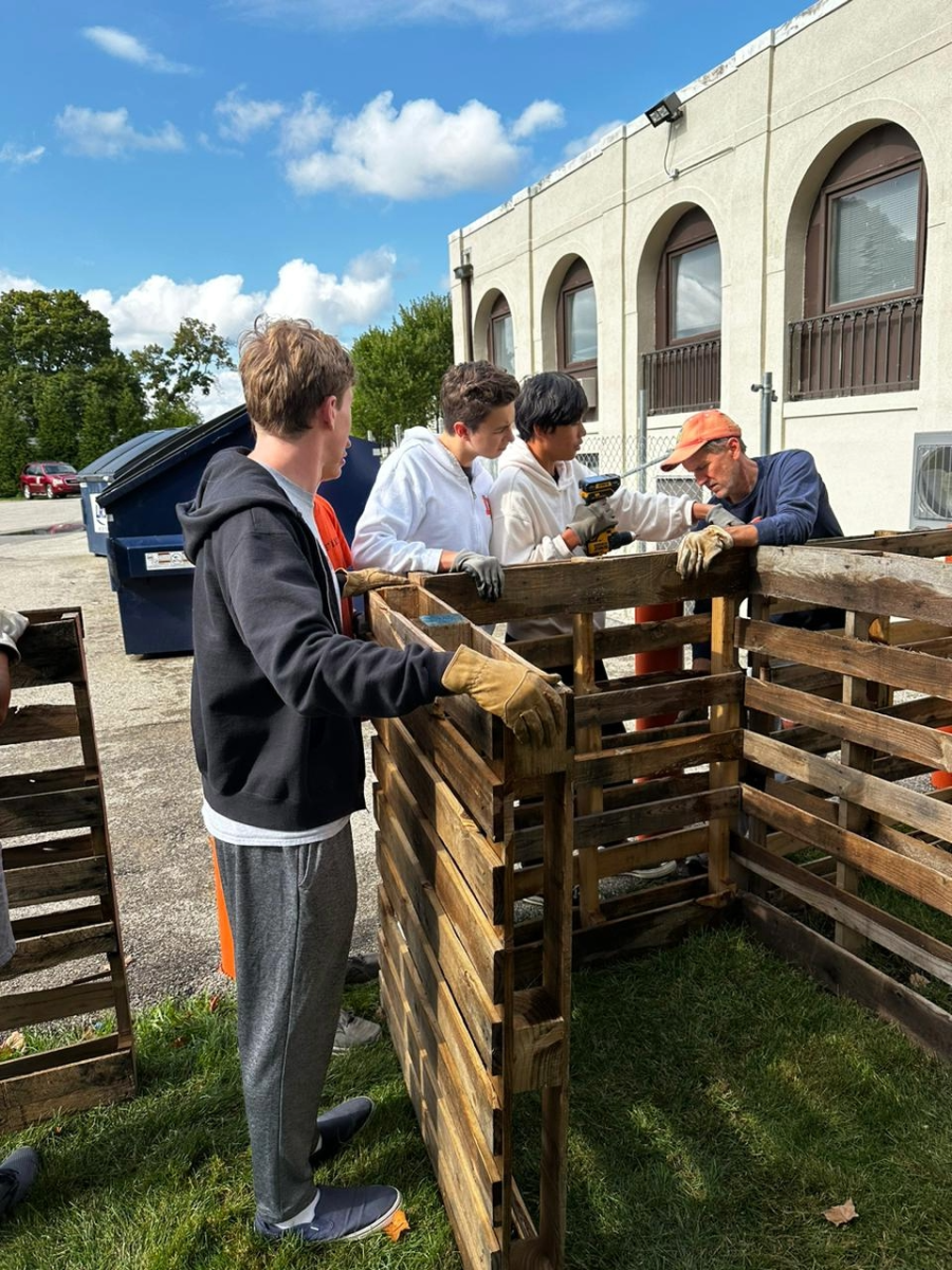 LFA Sustainability club building the new compost!