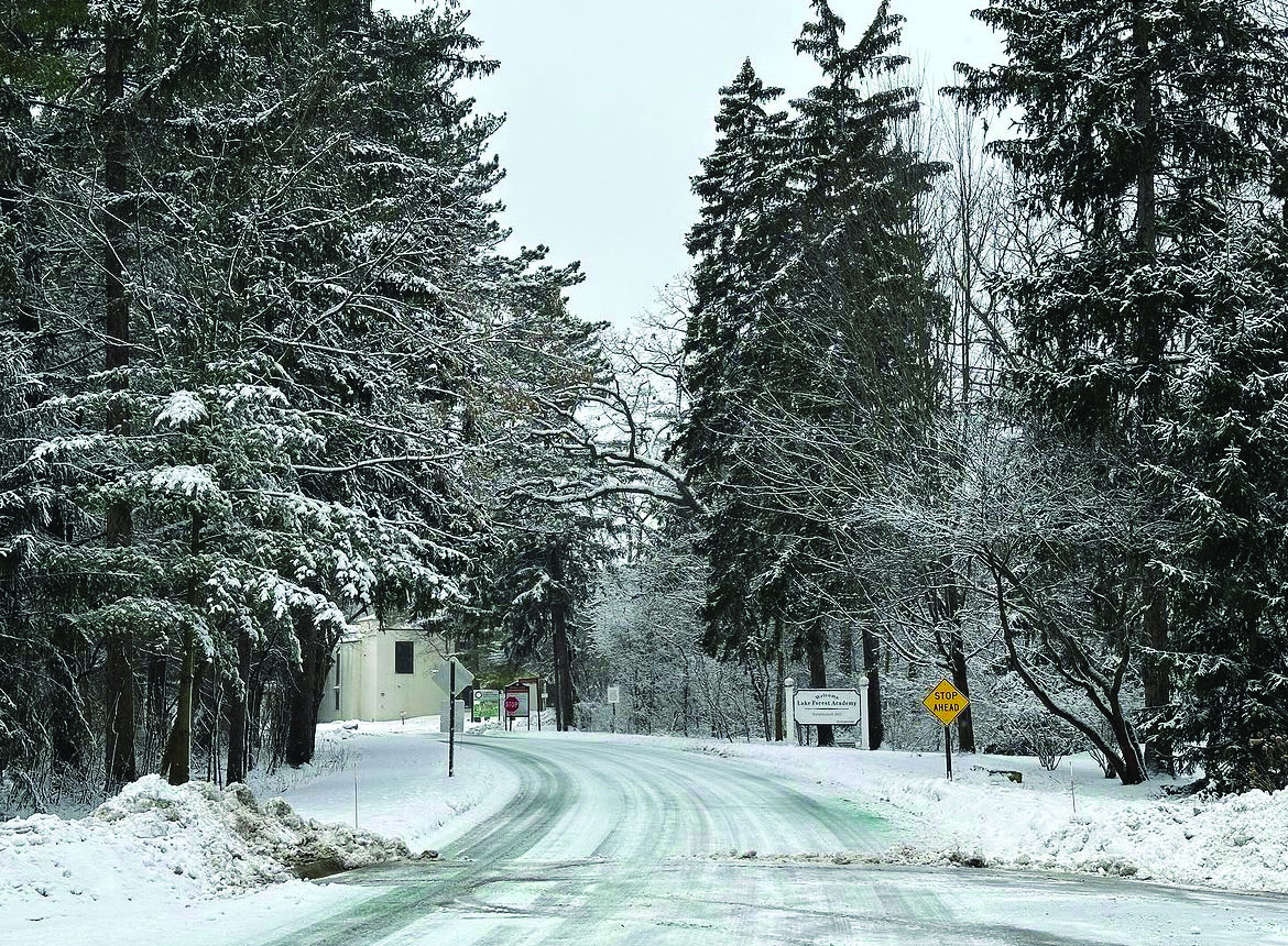 Academy road sits in snow during the freezing temperatures. 