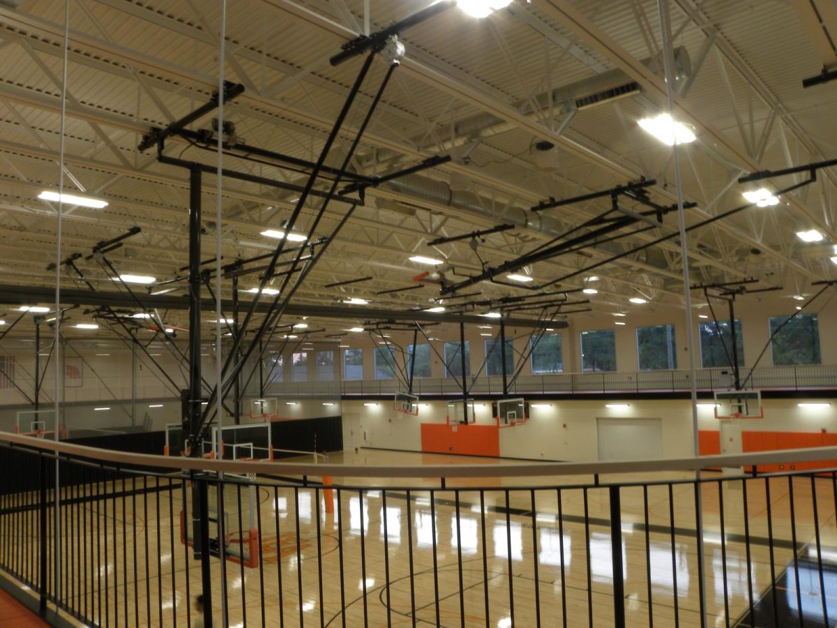 The new gymnasium includes three full basketball/volleyball courts.