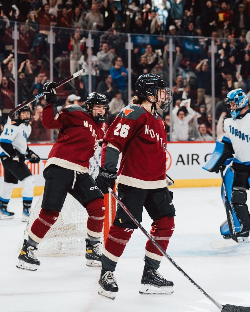 Montreal Victoire players celebrate after scoring a goal.