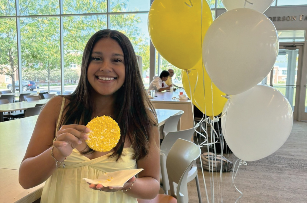 Lily Botero ‘25 poses with a Ferry Hall cookie.