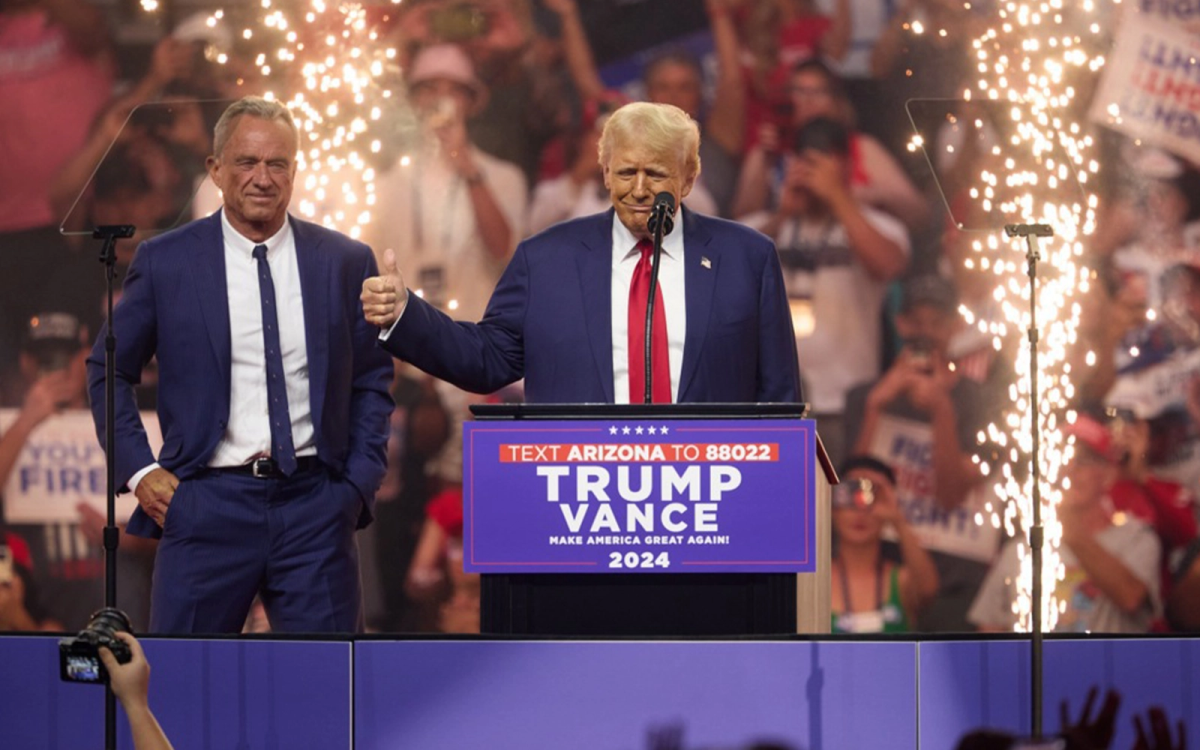 Donald Trump stands on stage with Robert F. Kennedy, Jr., his selection for Secretary of Health and Human Services. (Courtesy of Free Malaysia Today)