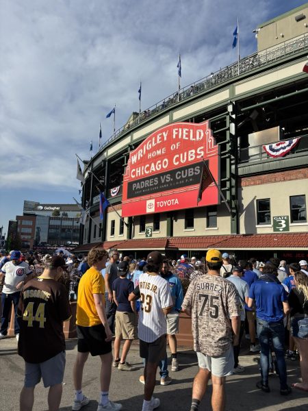 The famous Marquee outside Wrigley Field displays the game score.