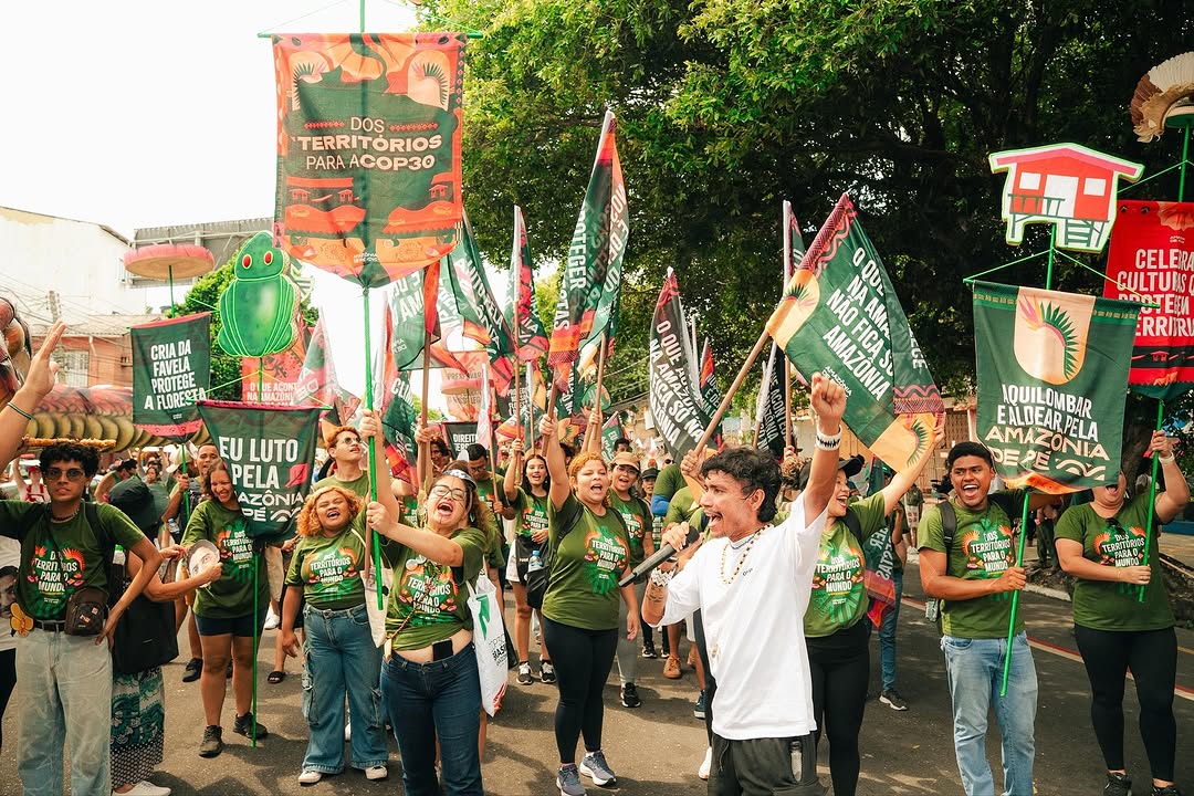 Climate protesters march to demand greater climate protection efforts in Belém Pará, Brazil.
