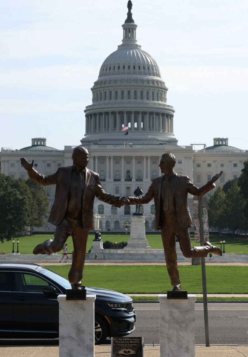 A statue of Donald Trump and Jeffrey Epstein stands in front of the U.S. Capitol. (Courtesy of @thecomplex on Instagram)