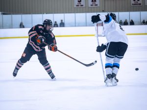 Romain Lellouche ‘26 shoots in a game against Team Illinois.