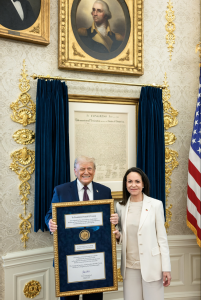 President Trump meets with Venezuelan Nobel Peace Prize winner, María Cornia Machado, in the oval office where she presents him with her award.