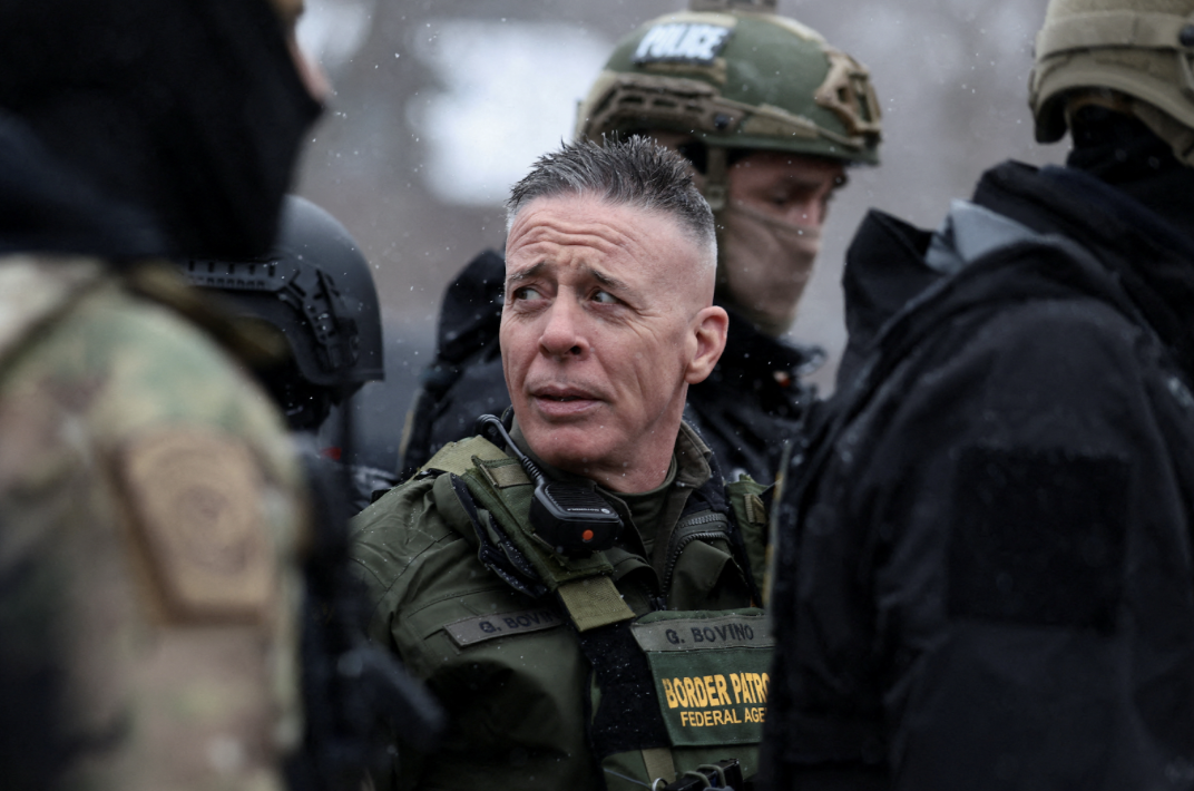 Border Patrol commander Gregory Bovino looks on at a gas station after a U.S. Immigration and Customs Enforcement agent fatally shot Renee Nicole Good on January 7. (Courtesy of REUTERS)