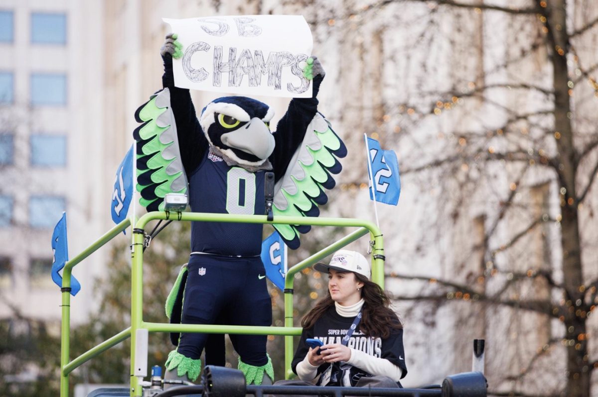 Seattle Seahawks mascot Blitz holds a sign during the Super Bowl LX
parade. (Courtesy of Imagn Images)