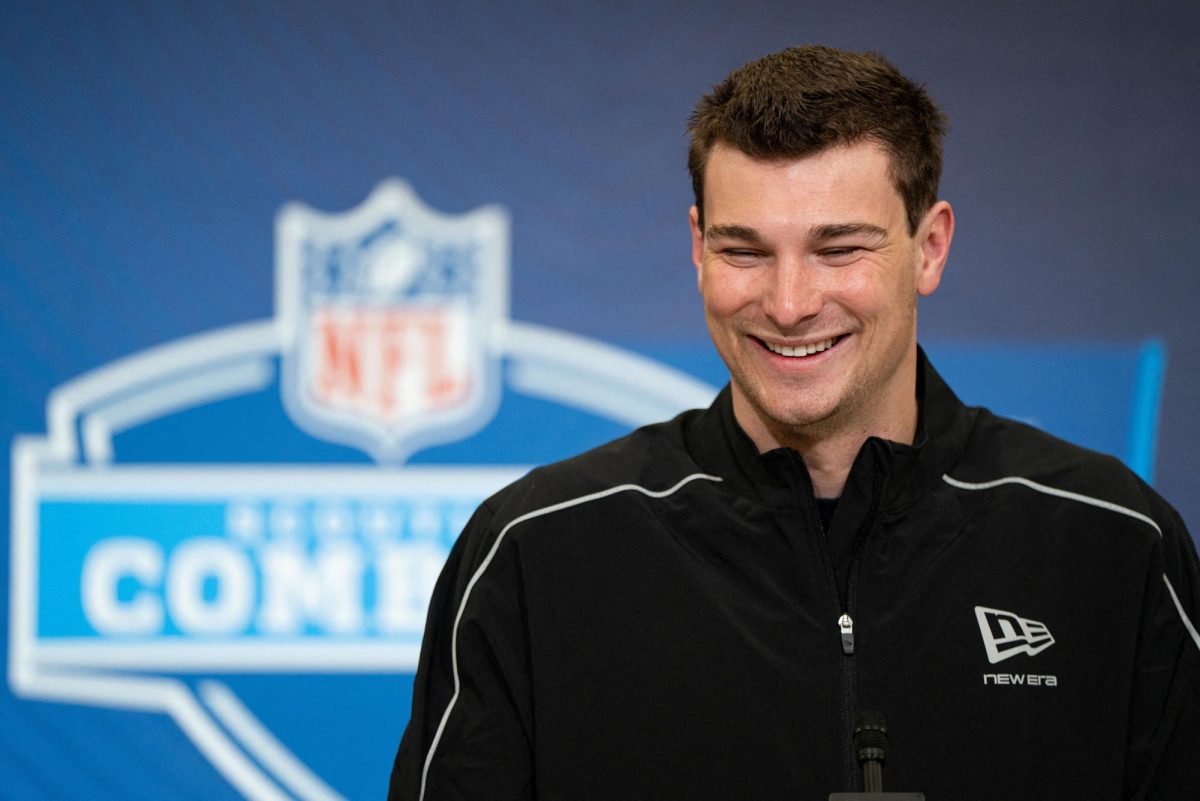 Feb 27, 2026; Indianapolis, IN, USA; Indiana quarterback Fernando Mendoza (QB11) speaks to members of the media during the NFL Combine at the Indiana Convention Center. Mandatory Credit: Jacob Musselman-Imagn Images