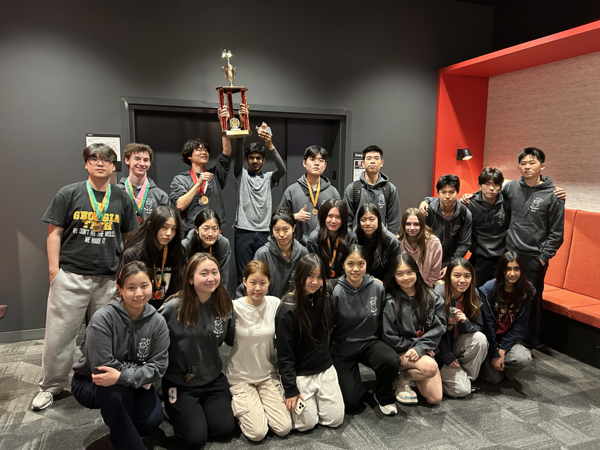 The LFA Math Team poses with their third place trophy.